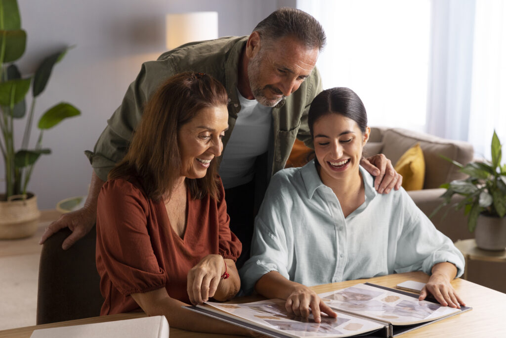 medium shot people looking picture album